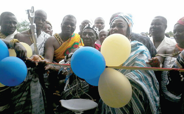 Ms Djaba cuting the tape to open the health centre